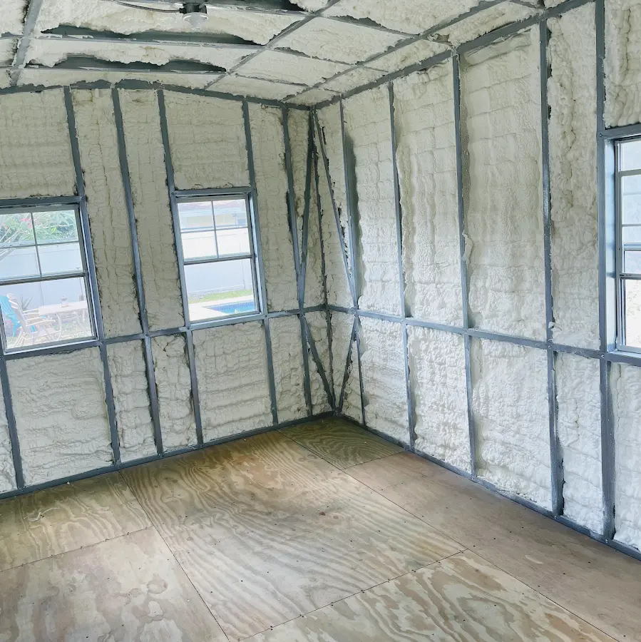 Closed-cell spray foam insulation applied to wall cavities in a residential project in Seymour